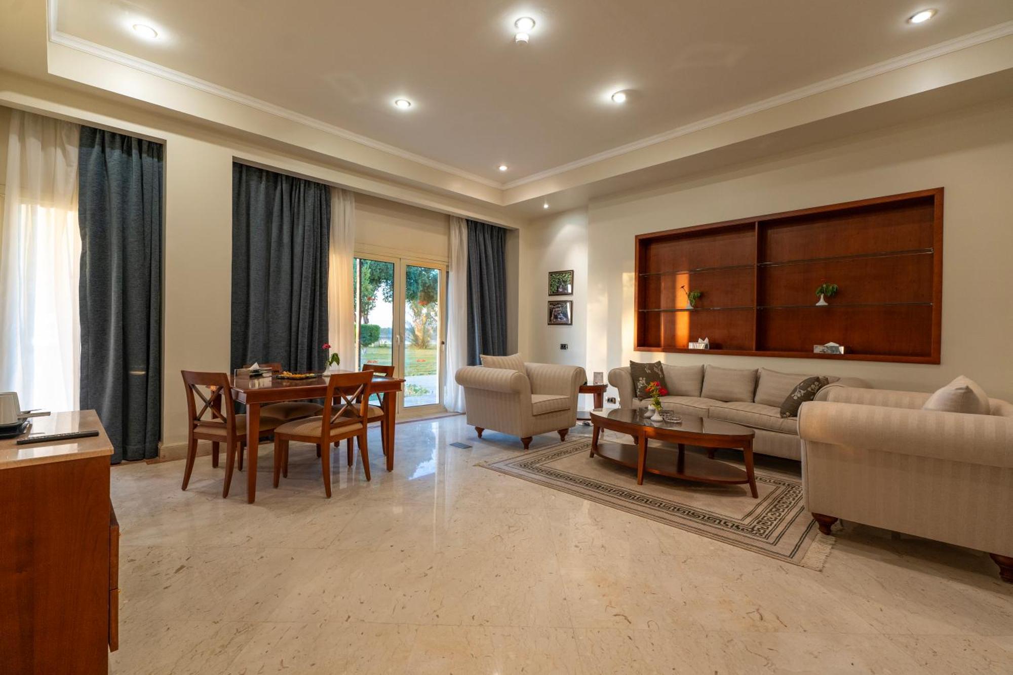 Jolie Ville Hotel & Spa Kings Island Luxor Bagian luar foto A living room